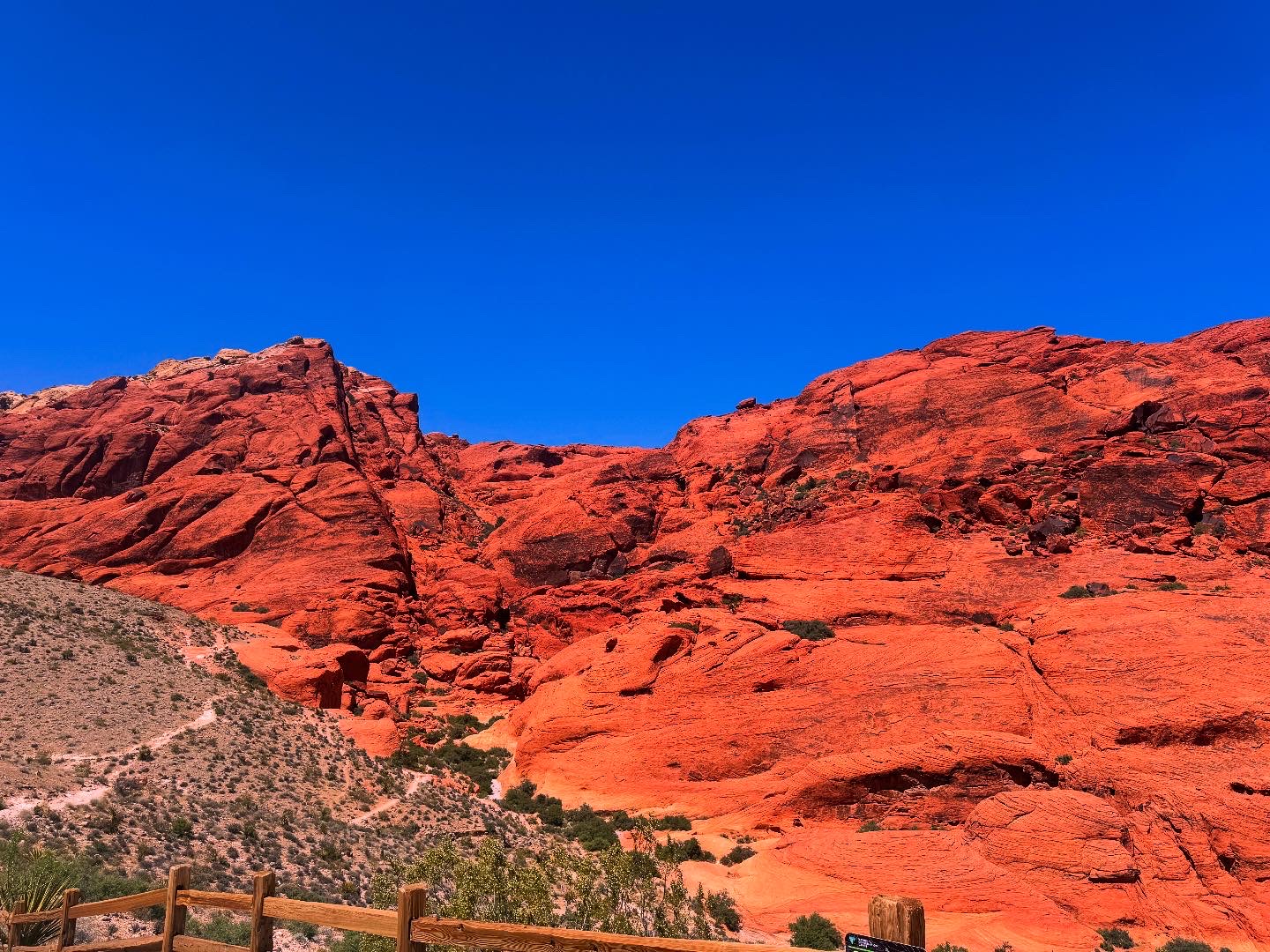 Red Rock Canyon rock formations against a deep blue sky